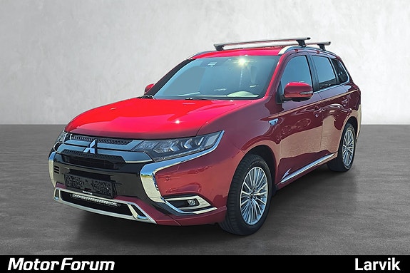 Rød SUV med stilrene LED-lys og praktiske takskinner.