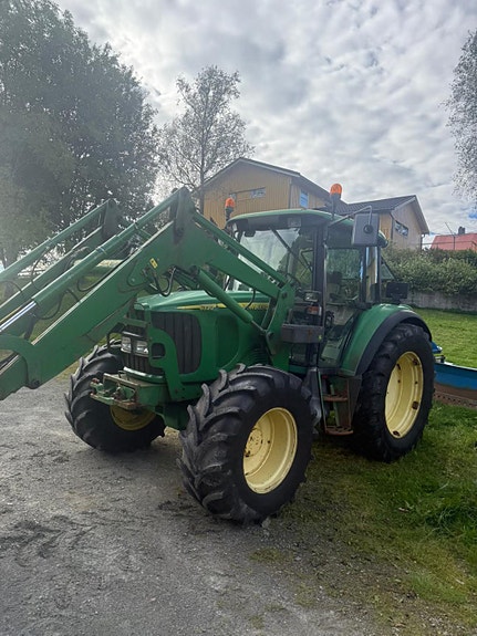 John Deere 6320 se 2 of 5
