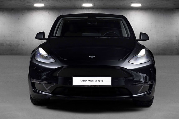 Tesla Model Y 4 of 5
