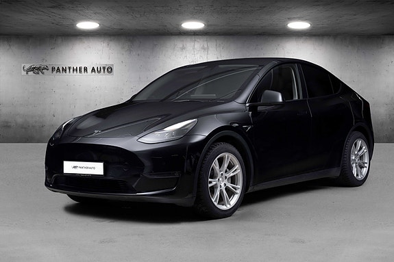 Tesla Model Y 2 of 5