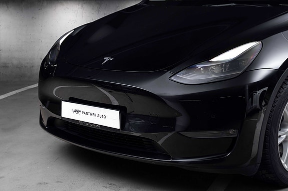 Tesla Model Y 3 of 5