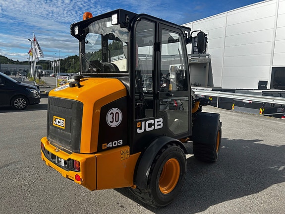 JCB 403 2 of 11