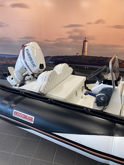 Suzumar 410 med 30 hk Evinrude. 2 of 8