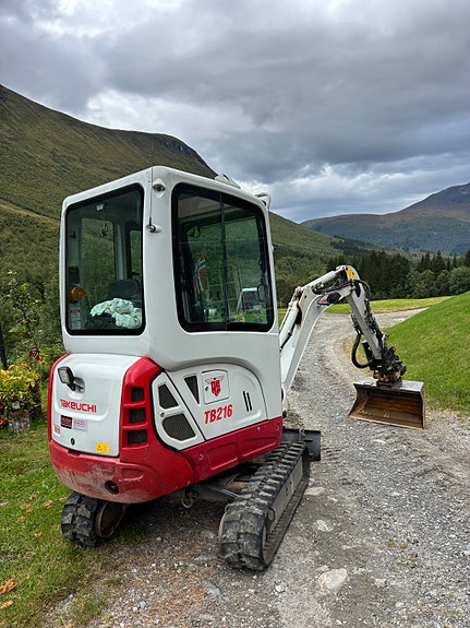 Takeuchi TB216 med rotortilt / 3 skoffer / 3000 timer 7 of 13