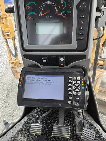 Cat 140m 3 of 7