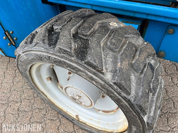 Genie GS-5390RT dieseldrevet terrengsakselift med 18,1 m arbeidshøyde og stor plattform 11 of 25