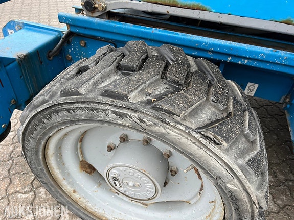 Genie GS-5390RT dieseldrevet terrengsakselift med 18,1 m arbeidshøyde og stor plattform 10 of 25