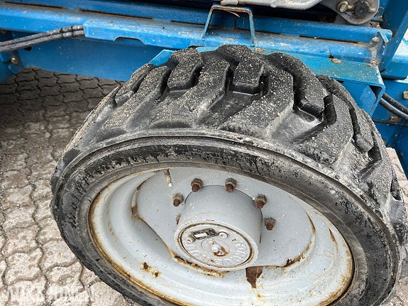 Genie GS-5390RT dieseldrevet terrengsakselift med 18,1 m arbeidshøyde og stor plattform 9 of 25