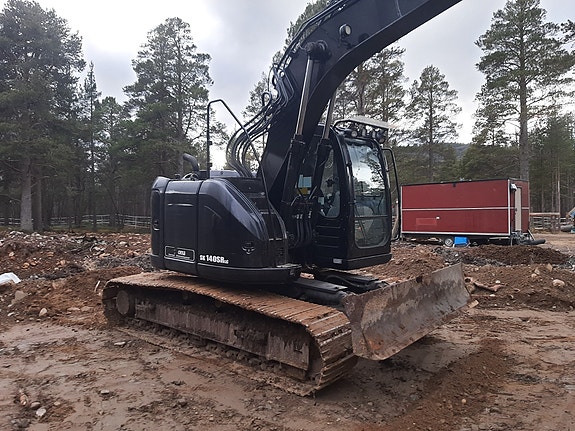 New Holland E 135 BSR-2 2 of 13