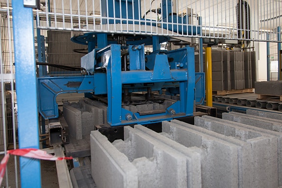 Palleterer pakker automatisk produktene på paller