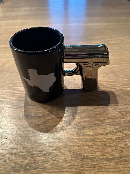 Kopp fra Texas med pistolhåndtak