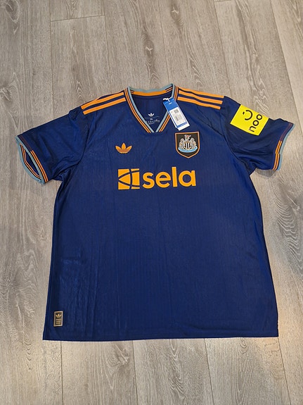 Ny Newcastledrakt ate 2xl