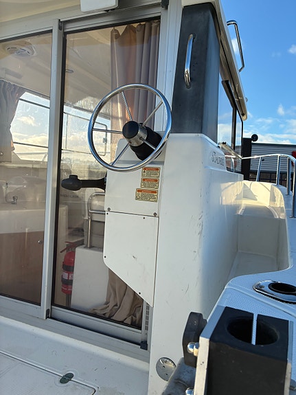 Quicksilver 675 PILOTHOUSE med 125 Mercury Optimax 13 of 17